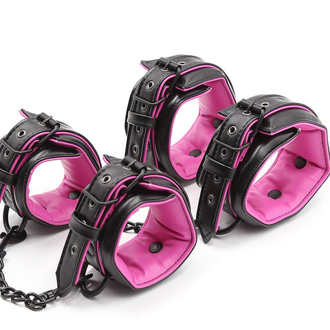 Leather Handcuffed Set featuring adjustable black and pink restraints for BDSM play.