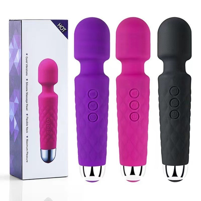 Magic Wand - Vibrator featuring pink and black designs for optimal pleasure and versatile use in various intimate activities.