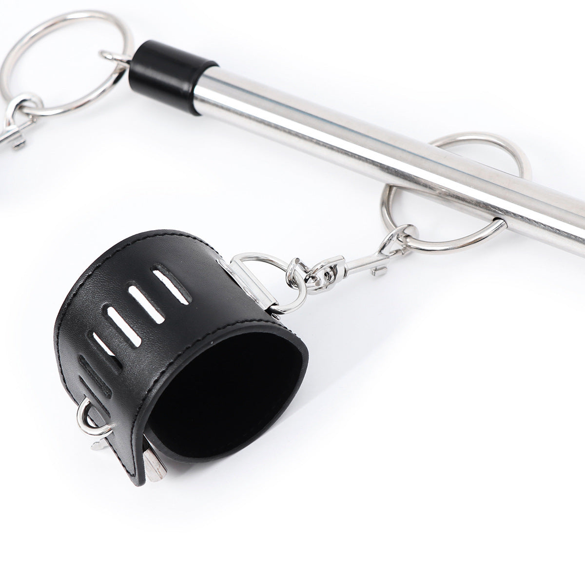 Midnight Desire sexy leather cuffs and steel rod designed for playful dominance and submission.