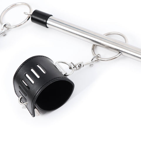 Midnight Desire sexy leather cuffs and steel rod designed for playful dominance and submission.